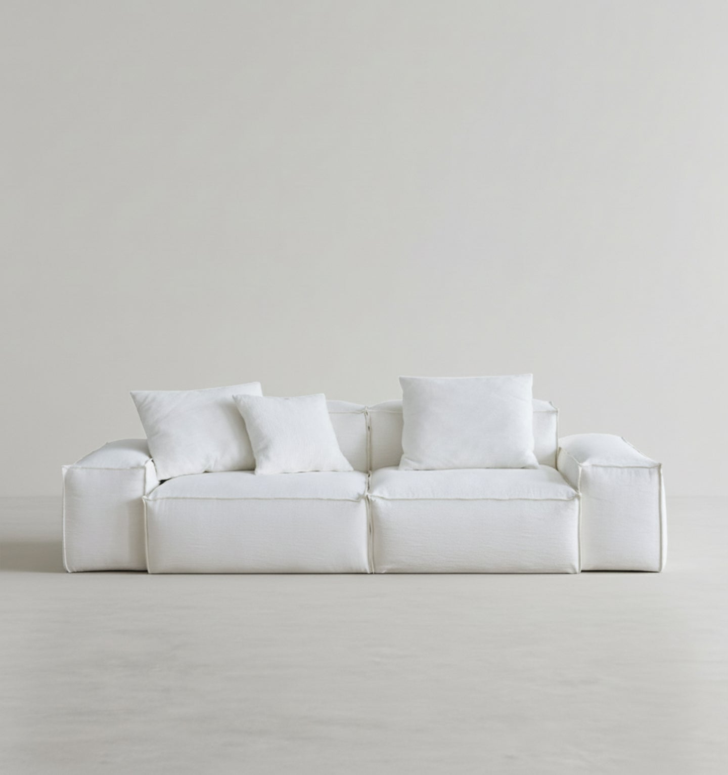 zaavan three seater sofa, modular sofa, white linen in modern living room