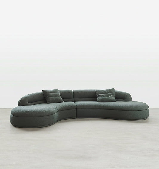 yannik four seater curved sofa, green in modern living room